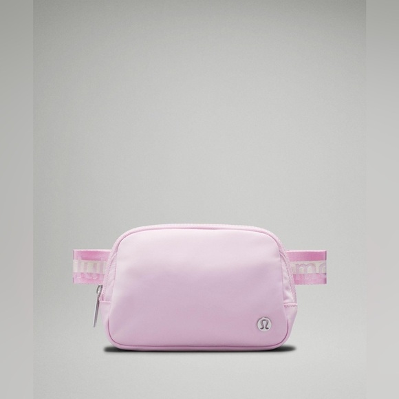 lululemon athletica Handbags - 🆕💕 Lululemon Everywhere Belt Bag Wordmark - Vitapink/White Opal/White